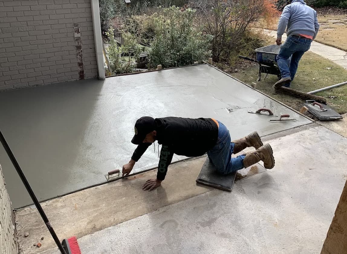Multi-level stamped concrete patio on a sloped Hoover lot